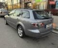 Серый Мазда 6, объемом двигателя 2 л и пробегом 245 тыс. км за 5700 $, фото 2 на Automoto.ua