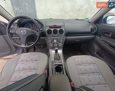 Серый Мазда 6, объемом двигателя 2 л и пробегом 364 тыс. км за 4400 $, фото 2 на Automoto.ua