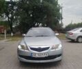 Серый Мазда 6, объемом двигателя 2 л и пробегом 350 тыс. км за 4800 $, фото 1 на Automoto.ua
