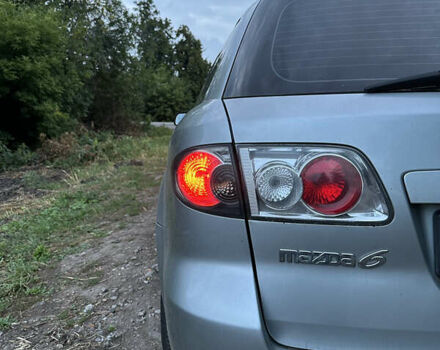 Серый Мазда 6, объемом двигателя 2 л и пробегом 309 тыс. км за 2550 $, фото 2 на Automoto.ua