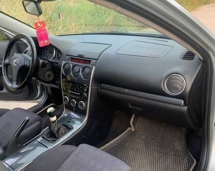 Серый Мазда 6, объемом двигателя 2 л и пробегом 349 тыс. км за 4400 $, фото 4 на Automoto.ua