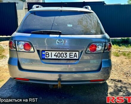 Серый Мазда 6, объемом двигателя 1.8 л и пробегом 200 тыс. км за 4999 $, фото 4 на Automoto.ua