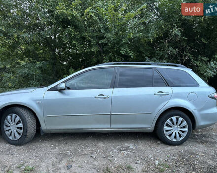 Серый Мазда 6, объемом двигателя 2 л и пробегом 309 тыс. км за 2550 $, фото 1 на Automoto.ua