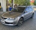 Серый Мазда 6, объемом двигателя 2 л и пробегом 325 тыс. км за 4999 $, фото 1 на Automoto.ua