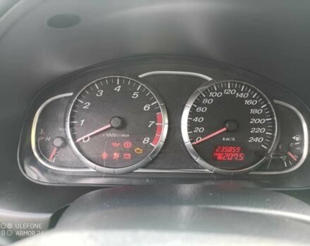 Серый Мазда 6, объемом двигателя 2 л и пробегом 235 тыс. км за 5400 $, фото 6 на Automoto.ua