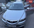 Серый Мазда 6, объемом двигателя 2 л и пробегом 225 тыс. км за 4000 $, фото 1 на Automoto.ua