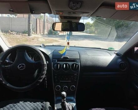 Серый Мазда 6, объемом двигателя 2 л и пробегом 327 тыс. км за 4400 $, фото 1 на Automoto.ua