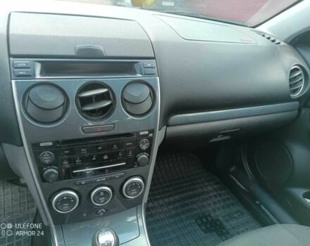 Серый Мазда 6, объемом двигателя 2 л и пробегом 235 тыс. км за 5400 $, фото 5 на Automoto.ua