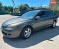 Серый Мазда 6, объемом двигателя 2 л и пробегом 255 тыс. км за 4399 $, фото 1 на Automoto.ua