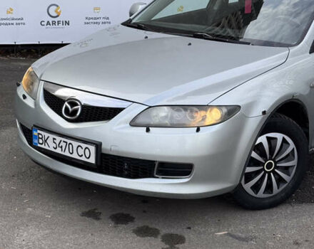 Сірий Мазда 6, об'ємом двигуна 2 л та пробігом 272 тис. км за 3999 $, фото 2 на Automoto.ua
