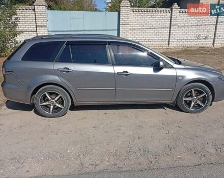 Серый Мазда 6, объемом двигателя 2 л и пробегом 327 тыс. км за 4400 $, фото 3 на Automoto.ua
