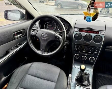 Серый Мазда 6, объемом двигателя 2 л и пробегом 427 тыс. км за 3400 $, фото 67 на Automoto.ua