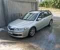 Серый Мазда 6, объемом двигателя 2 л и пробегом 238 тыс. км за 4200 $, фото 2 на Automoto.ua