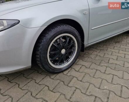 Сірий Мазда 6, об'ємом двигуна 2 л та пробігом 215 тис. км за 4250 $, фото 3 на Automoto.ua