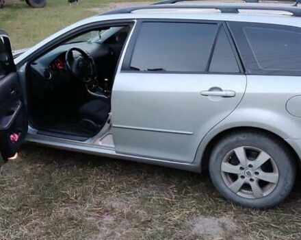 Серый Мазда 6, объемом двигателя 2 л и пробегом 250 тыс. км за 4500 $, фото 1 на Automoto.ua