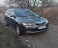 Серый Мазда 6, объемом двигателя 2 л и пробегом 238 тыс. км за 5000 $, фото 1 на Automoto.ua
