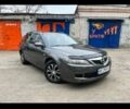 Серый Мазда 6, объемом двигателя 2 л и пробегом 143 тыс. км за 4750 $, фото 1 на Automoto.ua