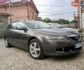 Серый Мазда 6, объемом двигателя 2 л и пробегом 310 тыс. км за 4000 $, фото 1 на Automoto.ua
