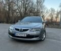 Серый Мазда 6, объемом двигателя 2 л и пробегом 354 тыс. км за 4500 $, фото 1 на Automoto.ua