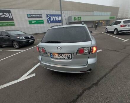 Серый Мазда 6, объемом двигателя 2 л и пробегом 234 тыс. км за 4600 $, фото 2 на Automoto.ua
