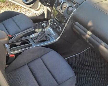 Серый Мазда 6, объемом двигателя 2 л и пробегом 295 тыс. км за 4100 $, фото 1 на Automoto.ua