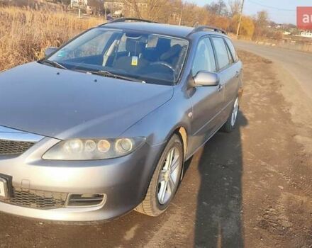 Сірий Мазда 6, об'ємом двигуна 2 л та пробігом 388 тис. км за 3800 $, фото 4 на Automoto.ua