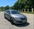 Серый Мазда 6, объемом двигателя 2 л и пробегом 340 тыс. км за 3125 $, фото 2 на Automoto.ua