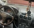 Серый Мазда 6, объемом двигателя 2 л и пробегом 265 тыс. км за 5600 $, фото 2 на Automoto.ua