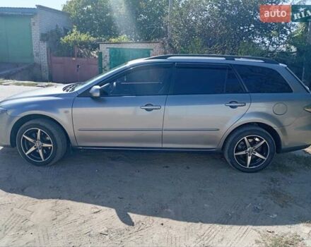 Серый Мазда 6, объемом двигателя 2 л и пробегом 327 тыс. км за 4400 $, фото 4 на Automoto.ua