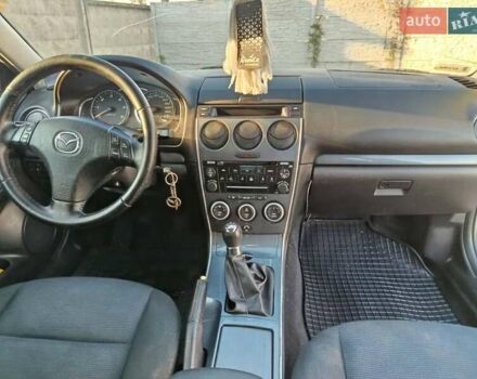 Серый Мазда 6, объемом двигателя 2 л и пробегом 300 тыс. км за 3800 $, фото 9 на Automoto.ua