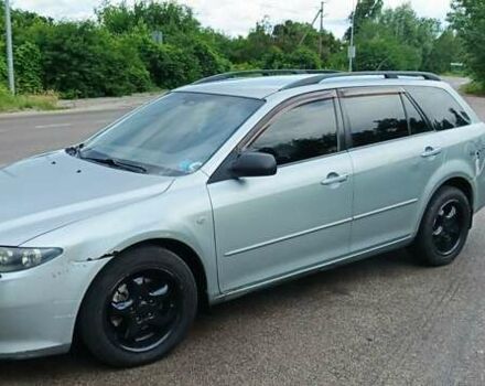 Серый Мазда 6, объемом двигателя 2 л и пробегом 316 тыс. км за 4200 $, фото 1 на Automoto.ua