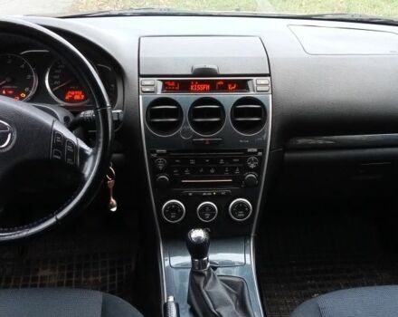 Серый Мазда 6, объемом двигателя 2 л и пробегом 247 тыс. км за 4000 $, фото 5 на Automoto.ua