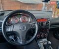 Серый Мазда 6, объемом двигателя 2 л и пробегом 145 тыс. км за 5300 $, фото 12 на Automoto.ua