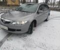 Серый Мазда 6, объемом двигателя 2 л и пробегом 306 тыс. км за 4300 $, фото 1 на Automoto.ua