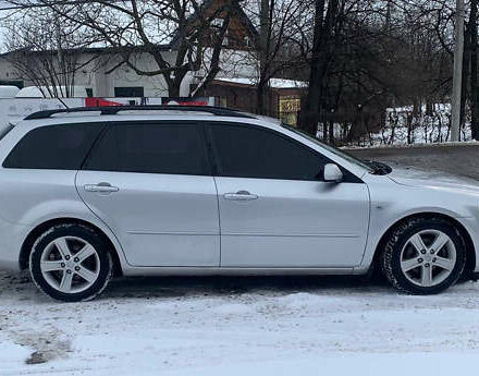 Серый Мазда 6, объемом двигателя 2 л и пробегом 258 тыс. км за 4700 $, фото 2 на Automoto.ua
