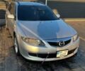 Серый Мазда 6, объемом двигателя 2 л и пробегом 252 тыс. км за 4900 $, фото 1 на Automoto.ua
