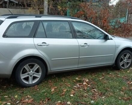 Серый Мазда 6, объемом двигателя 2 л и пробегом 247 тыс. км за 4000 $, фото 1 на Automoto.ua