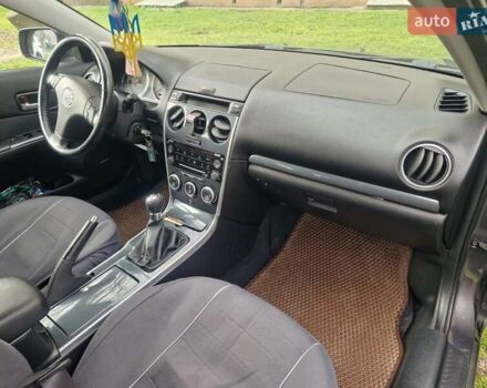 Серый Мазда 6, объемом двигателя 2 л и пробегом 145 тыс. км за 5300 $, фото 9 на Automoto.ua