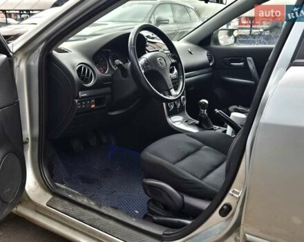 Серый Мазда 6, объемом двигателя 2 л и пробегом 227 тыс. км за 5600 $, фото 7 на Automoto.ua