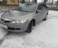 Сірий Мазда 6, об'ємом двигуна 2 л та пробігом 306 тис. км за 4300 $, фото 1 на Automoto.ua