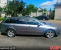 Серый Мазда 6, объемом двигателя 2 л и пробегом 267 тыс. км за 5000 $, фото 1 на Automoto.ua