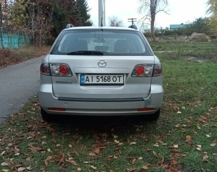 Серый Мазда 6, объемом двигателя 2 л и пробегом 247 тыс. км за 4000 $, фото 2 на Automoto.ua