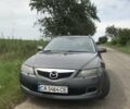 Серый Мазда 6, объемом двигателя 2 л и пробегом 340 тыс. км за 5100 $, фото 2 на Automoto.ua