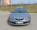 Серый Мазда 6, объемом двигателя 2 л и пробегом 210 тыс. км за 7200 $, фото 2 на Automoto.ua