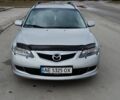 Серый Мазда 6, объемом двигателя 2 л и пробегом 295 тыс. км за 5500 $, фото 1 на Automoto.ua