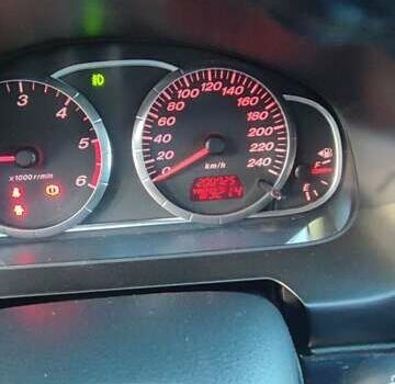 Серый Мазда 6, объемом двигателя 2 л и пробегом 200 тыс. км за 4900 $, фото 5 на Automoto.ua