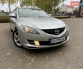 Серый Мазда 6, объемом двигателя 2 л и пробегом 274 тыс. км за 6499 $, фото 1 на Automoto.ua