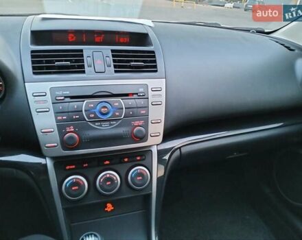 Серый Мазда 6, объемом двигателя 2 л и пробегом 255 тыс. км за 8000 $, фото 2 на Automoto.ua