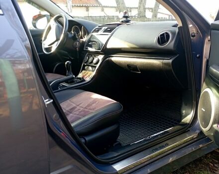 Сірий Мазда 6, об'ємом двигуна 2 л та пробігом 246 тис. км за 7600 $, фото 4 на Automoto.ua