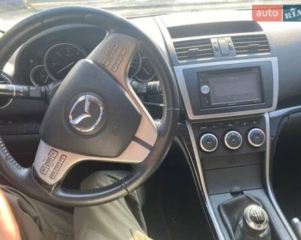 Серый Мазда 6, объемом двигателя 2 л и пробегом 229 тыс. км за 6300 $, фото 2 на Automoto.ua
